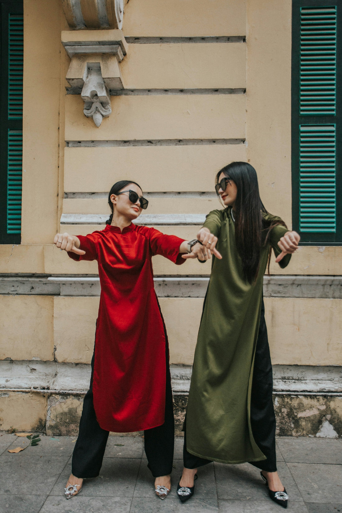 a couple of people standing next to each other